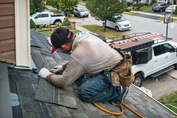 Professional Flat Roof Repair technician working in Crum, WV